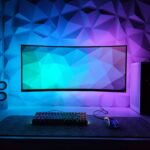 Ein moderner Philips Avent Dampfgarer und Mixer in einem kompakten Küchengerät, umgeben von frischem Gemüse und Babygläschen, symbolisiert die vielseitige 4-in-1-Funktion zur schonenden Babynahrungszubereitung.